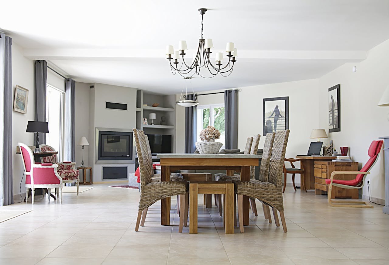 Rectangular Brown Wooden Dining Table and Six Gray Chairs Indoors